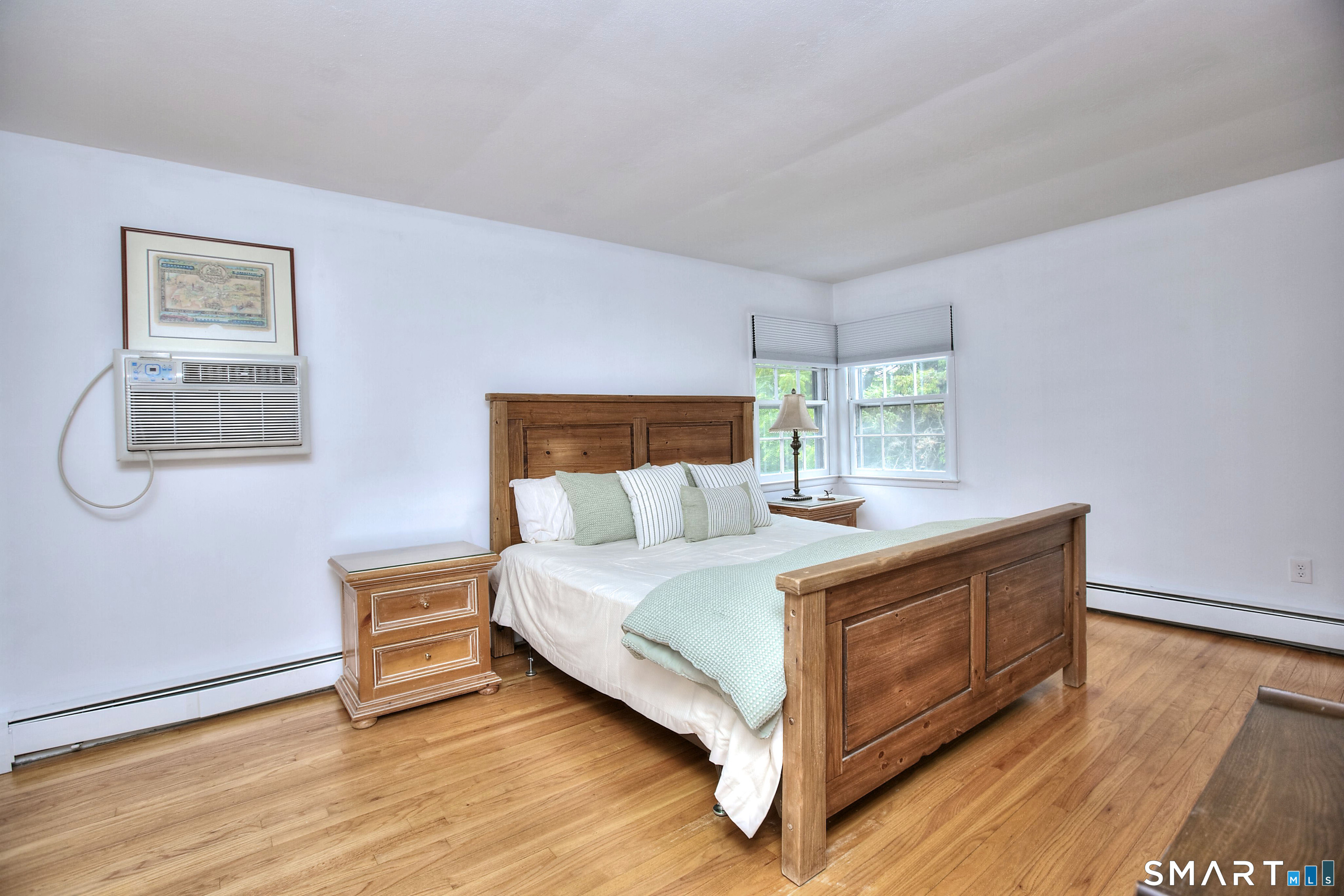 324 Ridge Road Orange, CT 06477 - Photo 24 of 38 a room with a bed and window