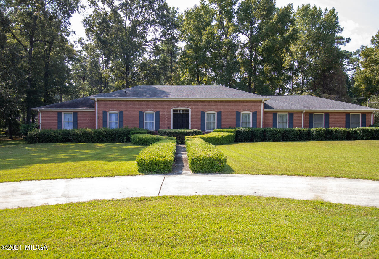 a view of a house with a swimming pool