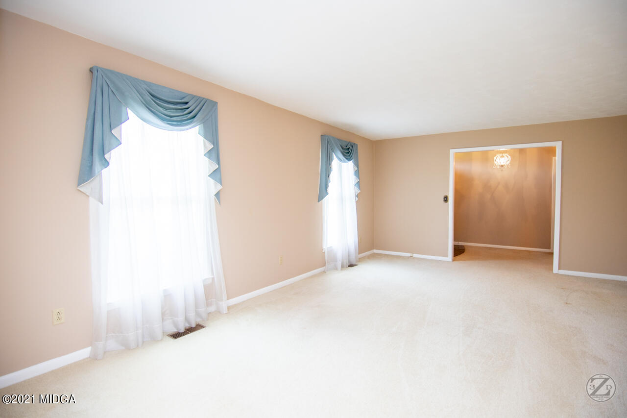 1027 Country Club Road Perry, GA 31069 - Photo 18 of 55 a view of an empty room