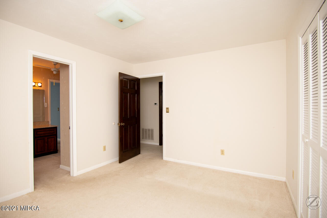 1027 Country Club Road Perry, GA 31069 - Photo 33 of 55 a view of an empty room
