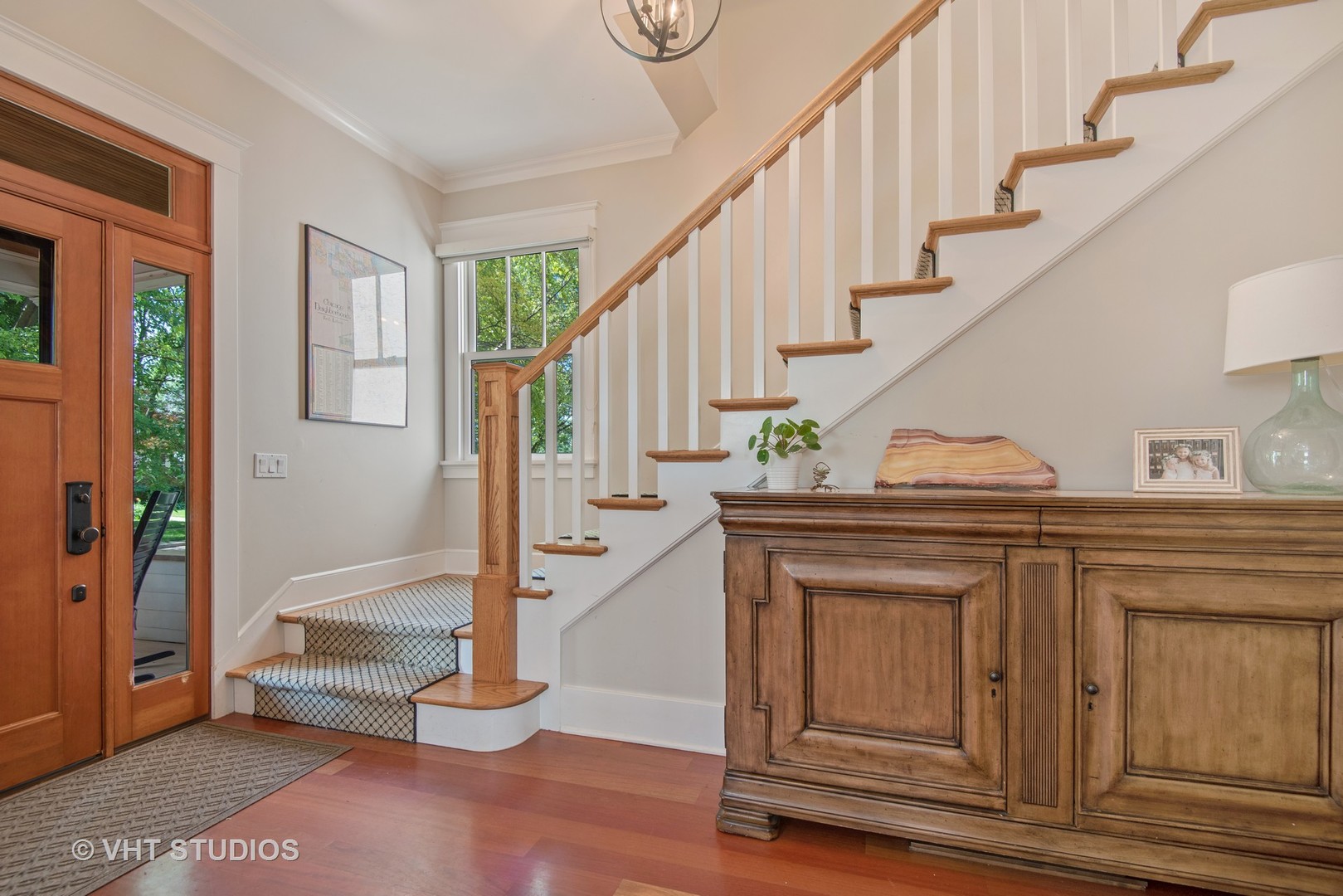 2121 Forestview Road Evanston, IL 60201 - Photo 3 of 35 a view of entryway livingroom and hall with wooden floor