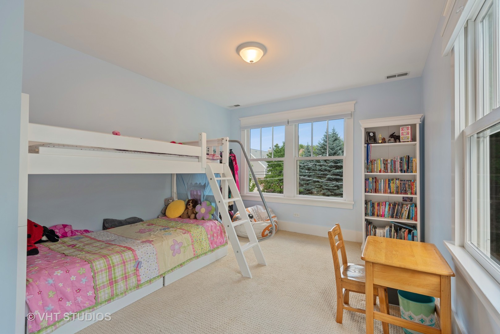 2121 Forestview Road Evanston, IL 60201 - Photo 21 of 35 a bedroom with a bed and a book shelf