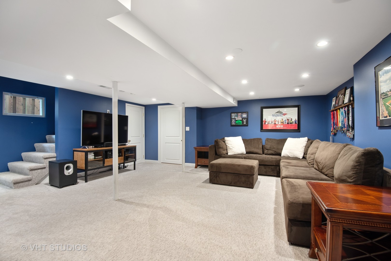 2121 Forestview Road Evanston, IL 60201 - Photo 25 of 35 a living room with furniture and a flat screen tv