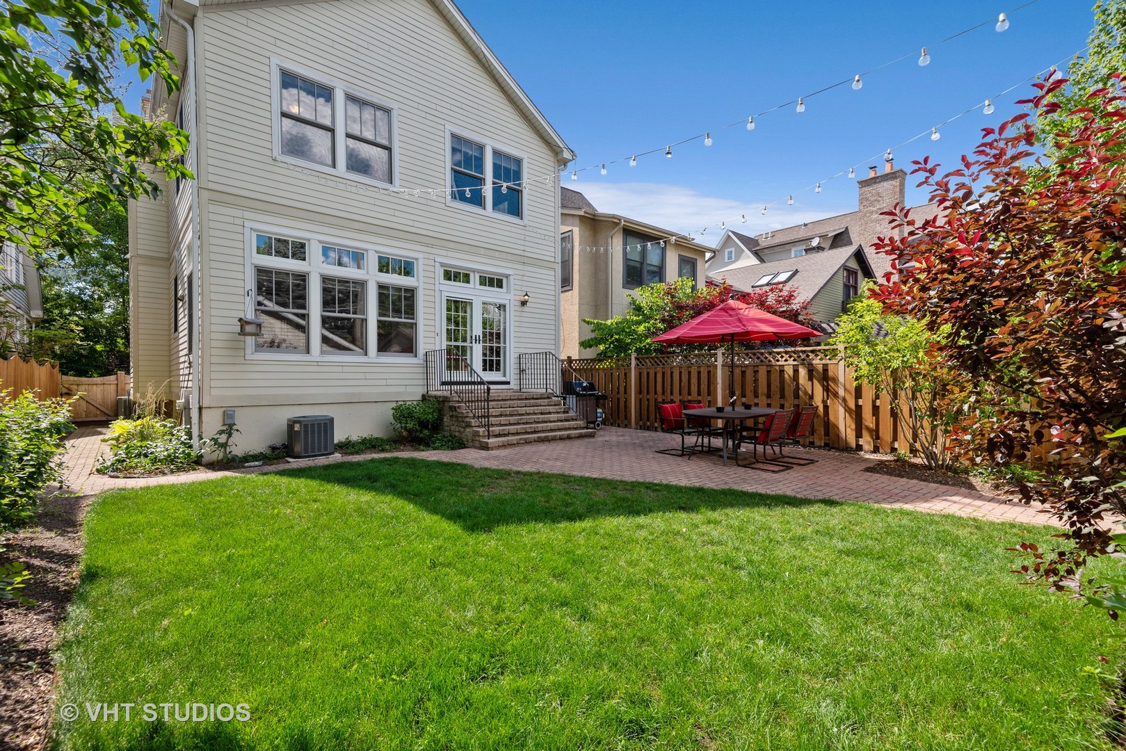 2121 Forestview Road Evanston, IL 60201 - Photo 28 of 35 a view of a house with a yard and sitting area