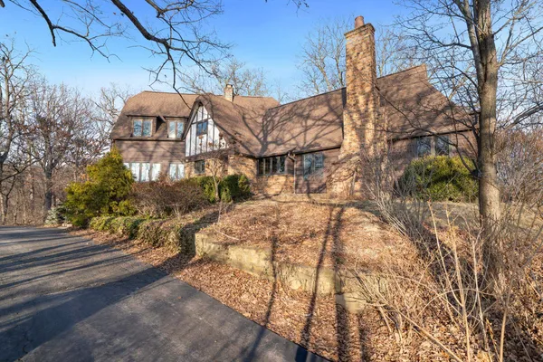 a front view of a house with yard