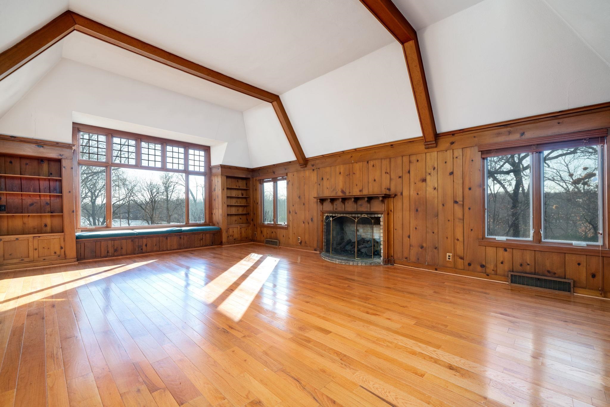 959 North River Road Oregon, IL 61061 - Photo 17 of 63 a view of an empty room with wooden floor and a window