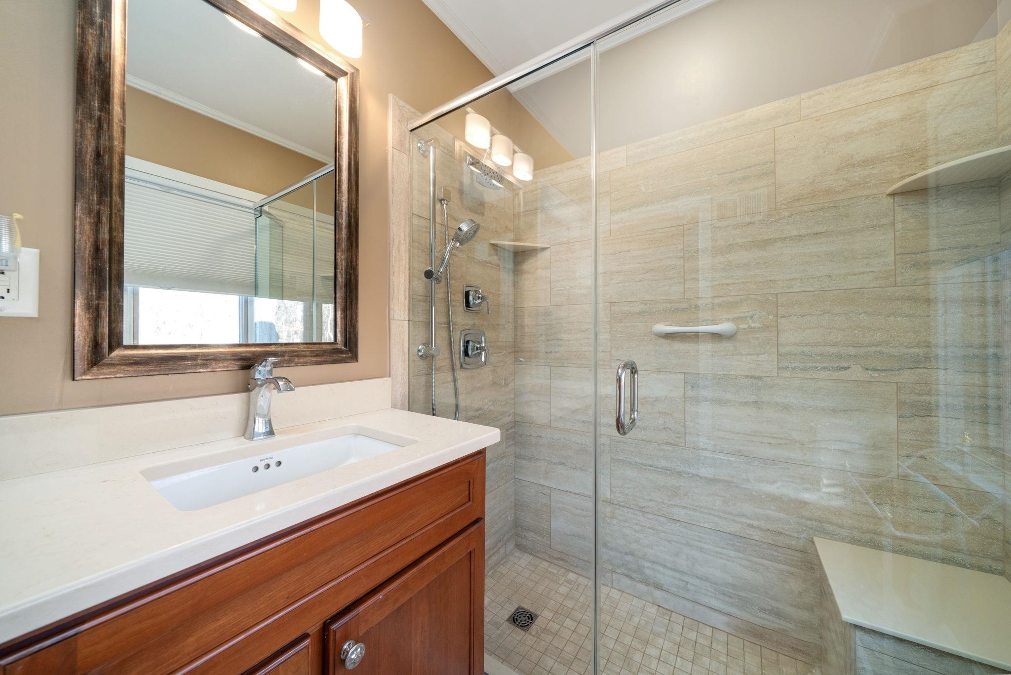 959 North River Road Oregon, IL 61061 - Photo 30 of 63 a bathroom with a sink shower and a mirror
