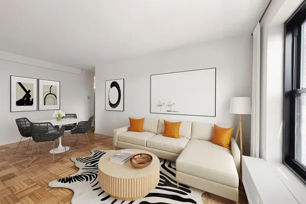 a living room with furniture and a window