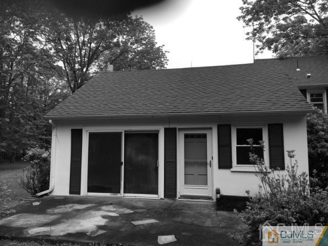 278 Springhill Road Skillman, NJ 08558 - Photo 4 of 4 a front view of a house with a garden