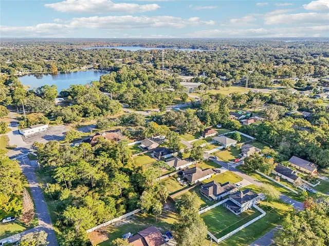 an aerial view of residential building with parking space