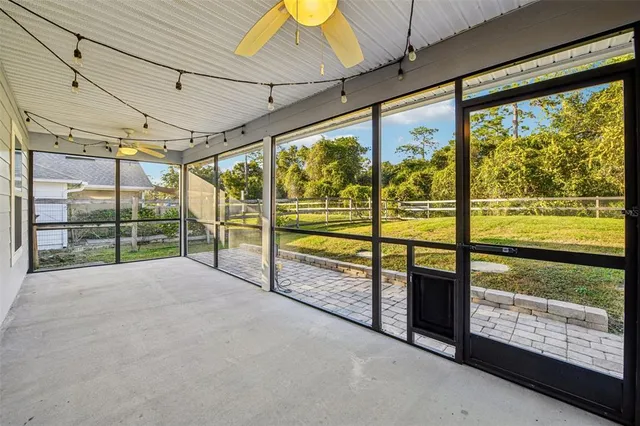 a view of an empty room with sliding door