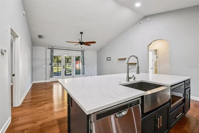 a kitchen with a stove and a sink
