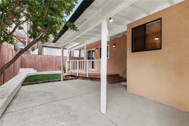 a view of a house with a yard and a garage