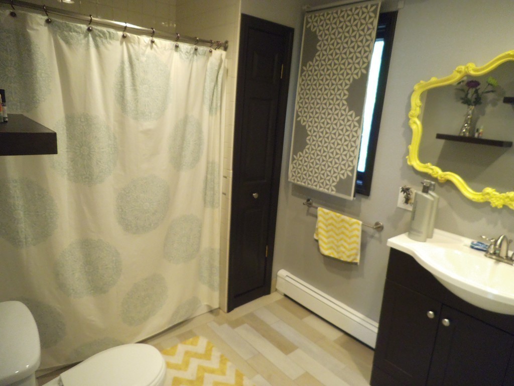 549 Buffinton Street Fall River, MA 02721 - Photo 10 of 17 a bathroom with a sink and toilet