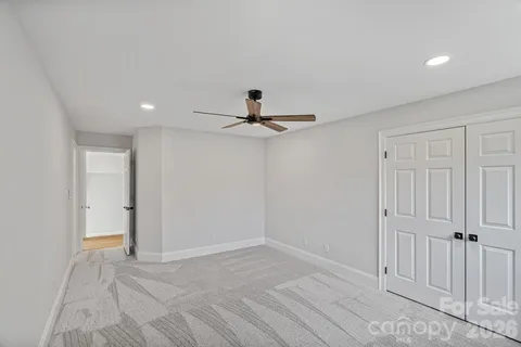 a bathroom with double vanity sink and a mirror