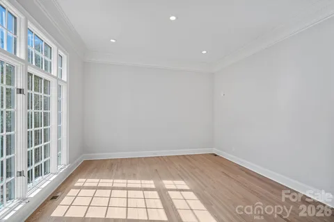 a view of empty room with windows
