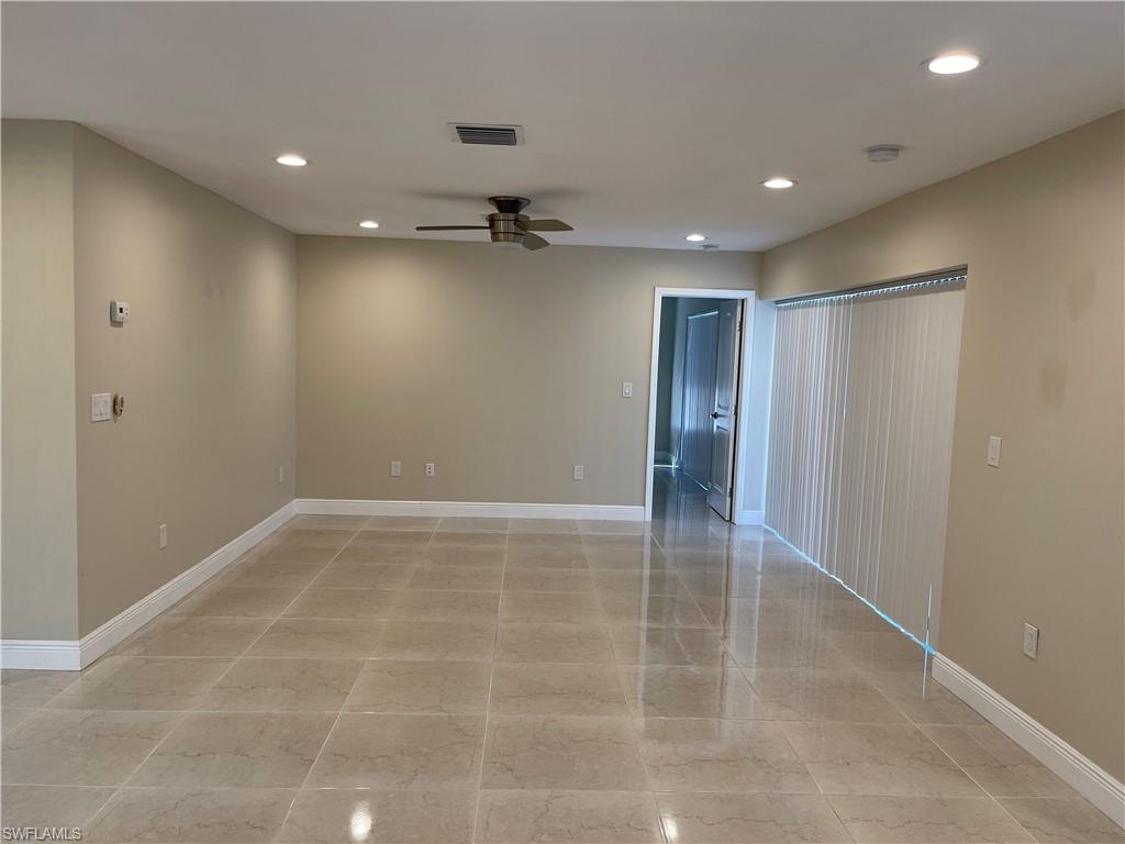 255 Pine Valley Circle Naples, FL 34113 - Photo 11 of 27 a view of an empty room