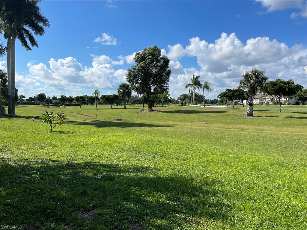 255 Pine Valley Circle Naples, FL 34113 - Photo 22 of 27 a view of an ocean and beach