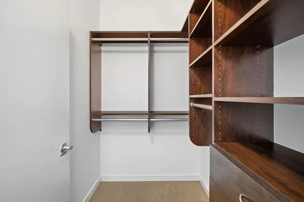 a view of a room with racks on the wall