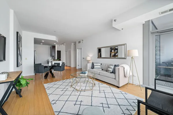 a living room with furniture and a table