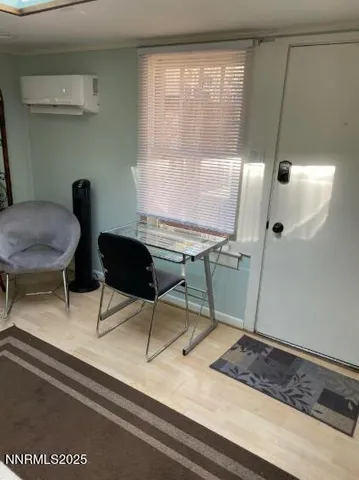 a workspace with furniture and window