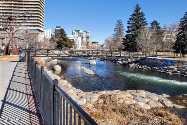 a view of swimming pool from a balcony