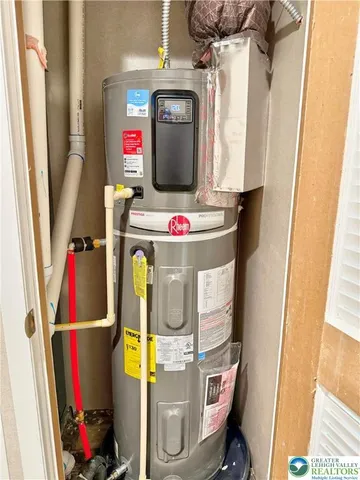 a view of a room with wooden floor and windows