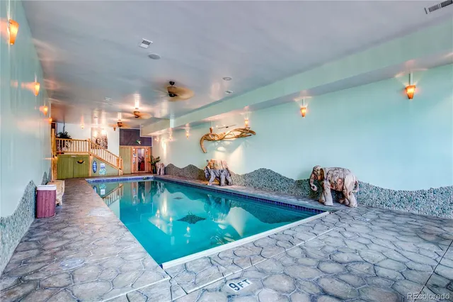 a kitchen with a sink and breakfast area