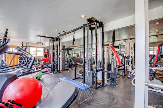 a view of a room with gym equipment