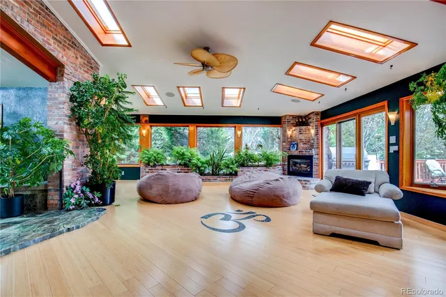 a building outdoor space with patio furniture and potted plants
