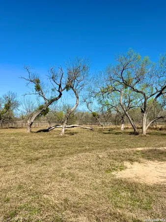 a view of a lake with beach