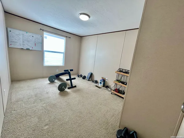 a room with furniture and a window