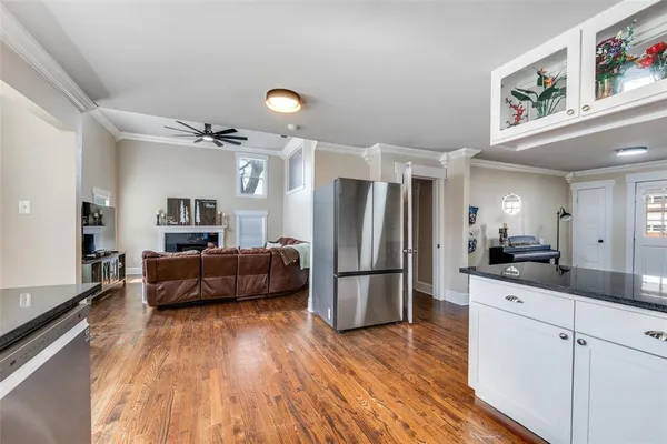 a view of a living room and entryway