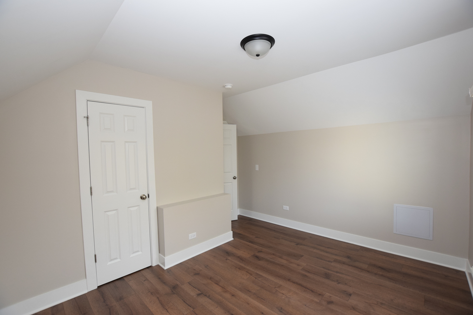 412 Lincoln Avenue, Unit B Fox River Grove, IL 60021 - Photo 12 of 16 a view of an empty room with wooden floor