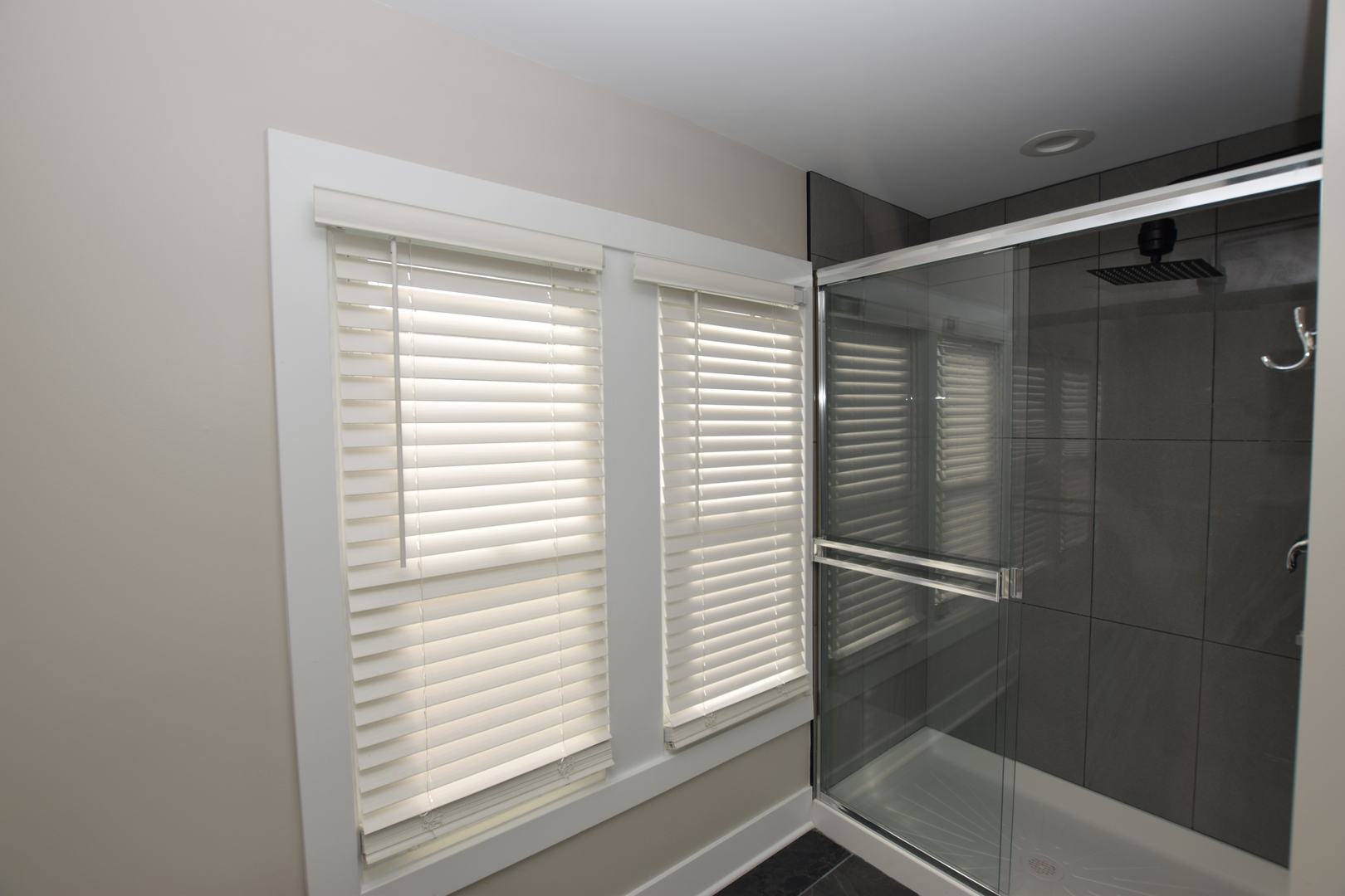 412 Lincoln Avenue, Unit B Fox River Grove, IL 60021 - Photo 14 of 16 a bathroom with a shower and a sink