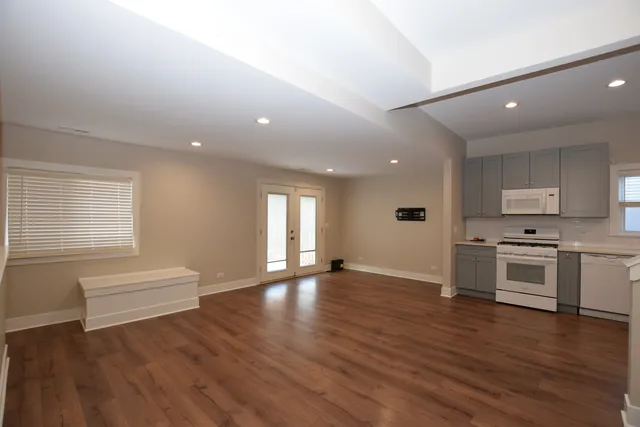 a view of kitchen with sink microwave and stove