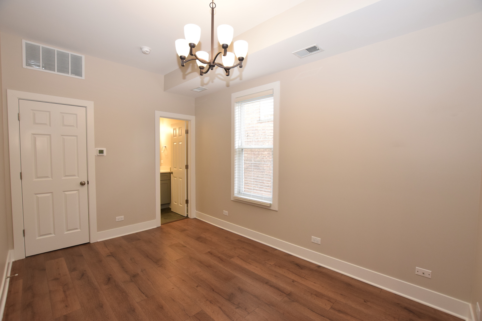 412 Lincoln Avenue, Unit B Fox River Grove, IL 60021 - Photo 7 of 16 a view of an empty room with a window