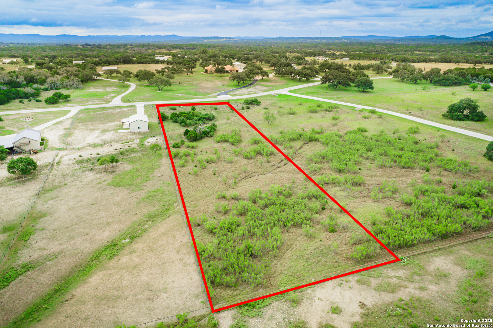 Lot 6 Bridlegate Boulevard Bandera, TX 78003 - Photo 4 of 6 a view of an outdoor space