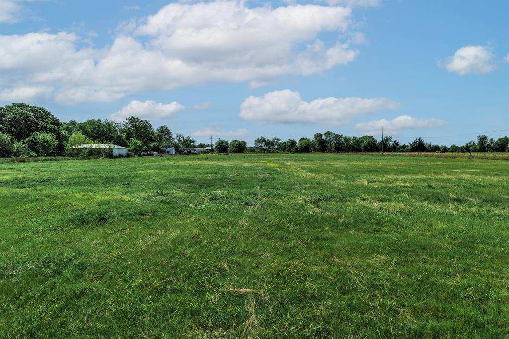 0 Fm 2101 Stuart, TX 74570 - Photo 15 of 32 a view of a field of grass and trees