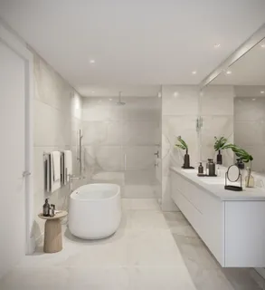 a bathroom with a sink a bathtub and a shower