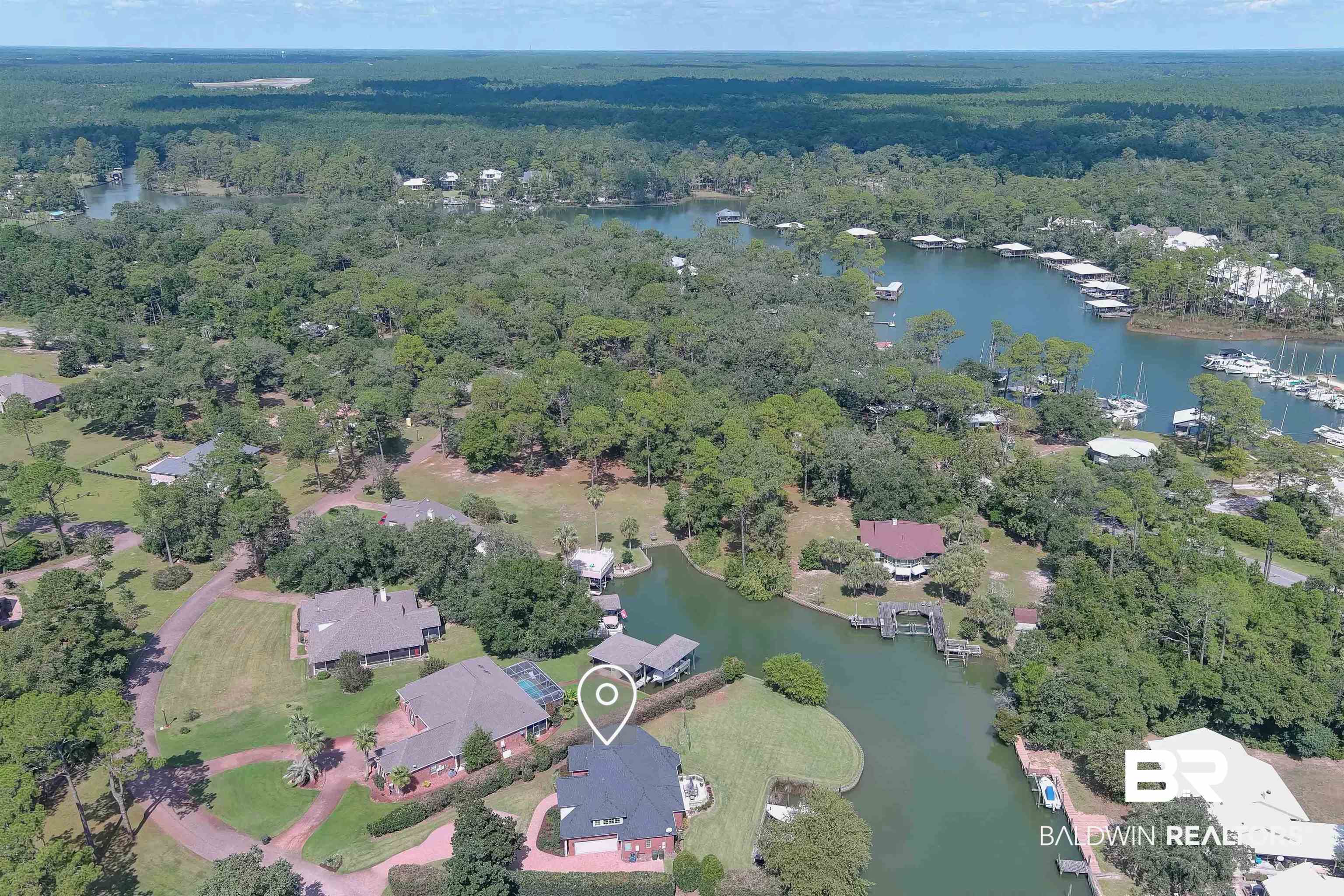 6630 East Quarry Drive Elberta, AL 36530 - Photo 60 of 63 Aerial view of property's location with a large body of water and nearby suburban area