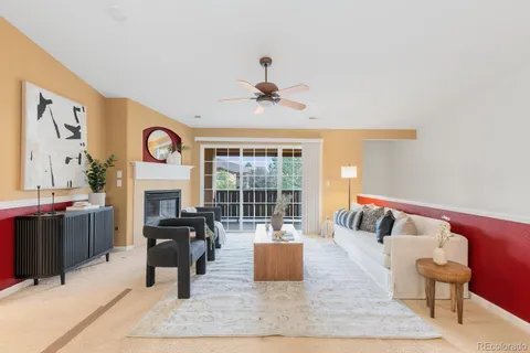 a living room with furniture rug and window