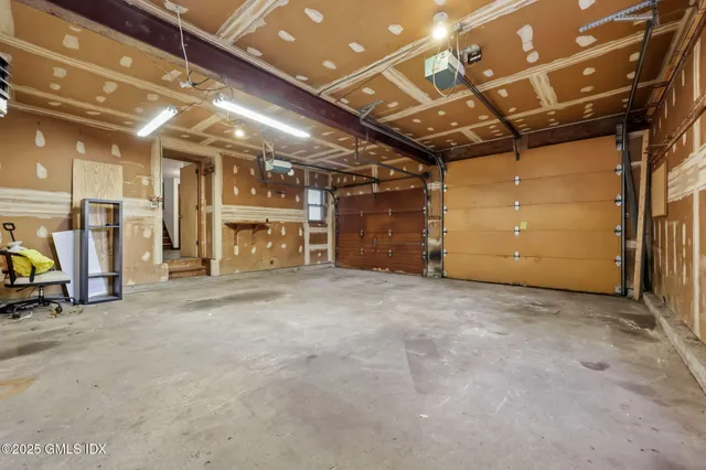 a front view of a house with a big yard