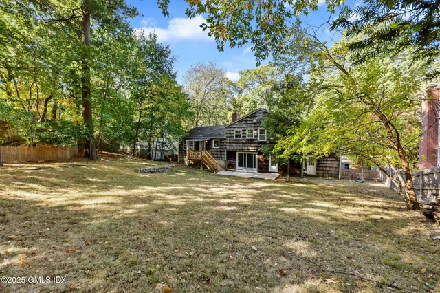 a picture of a wall with a white wall and a white refrigerator