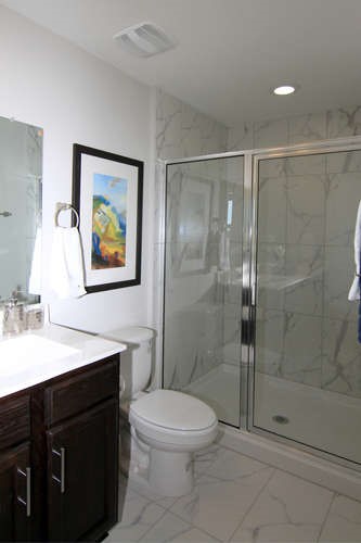 708 Tinton Falls Lane Pflugerville, TX 78660 - Photo 27 of 40 a bathroom with a sink a toilet and shower