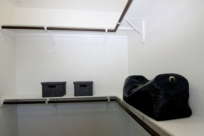 708 Tinton Falls Lane Pflugerville, TX 78660 - Photo 29 of 40 a table with wooden floor and shoes