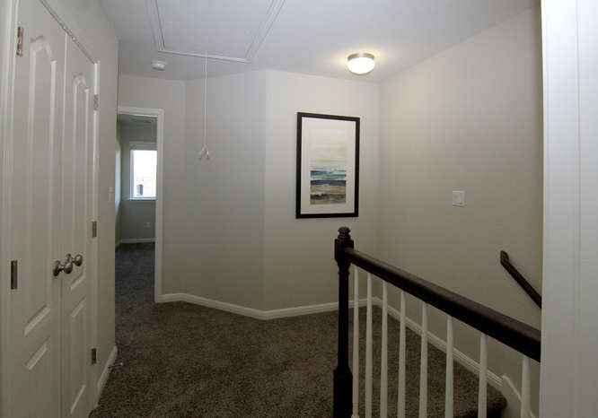 708 Tinton Falls Lane Pflugerville, TX 78660 - Photo 36 of 40 a view of hallway with stairs
