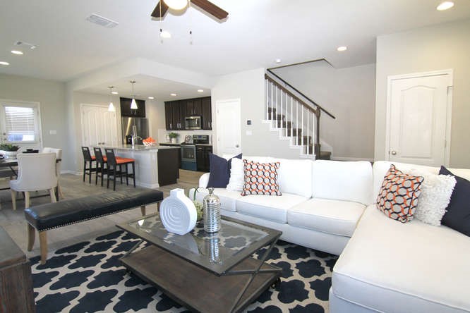 708 Tinton Falls Lane Pflugerville, TX 78660 - Photo 8 of 40 a living room with furniture and wooden floor