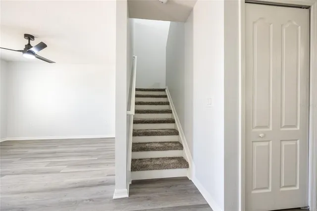 a view of a room with porch and a backyard