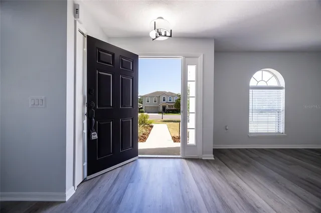 a bathroom with a shower and a toilet